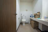 This property features a clean and functional bathroom with a toilet and sink.