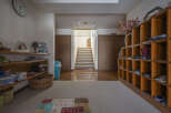This charming home features a spacious entryway with ample storage, perfect for keeping shoes and other items organized.