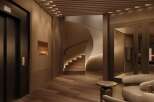 Experience luxurious living in this stunning building, featuring a sleek elevator, a modern curved staircase, and a sophisticated lobby.