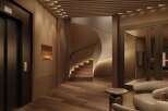 Experience luxurious living in this stunning building, featuring a sleek elevator, a modern curved staircase, and a sophisticated lobby.