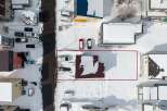 This snow-covered lot is perfect for building your dream home.