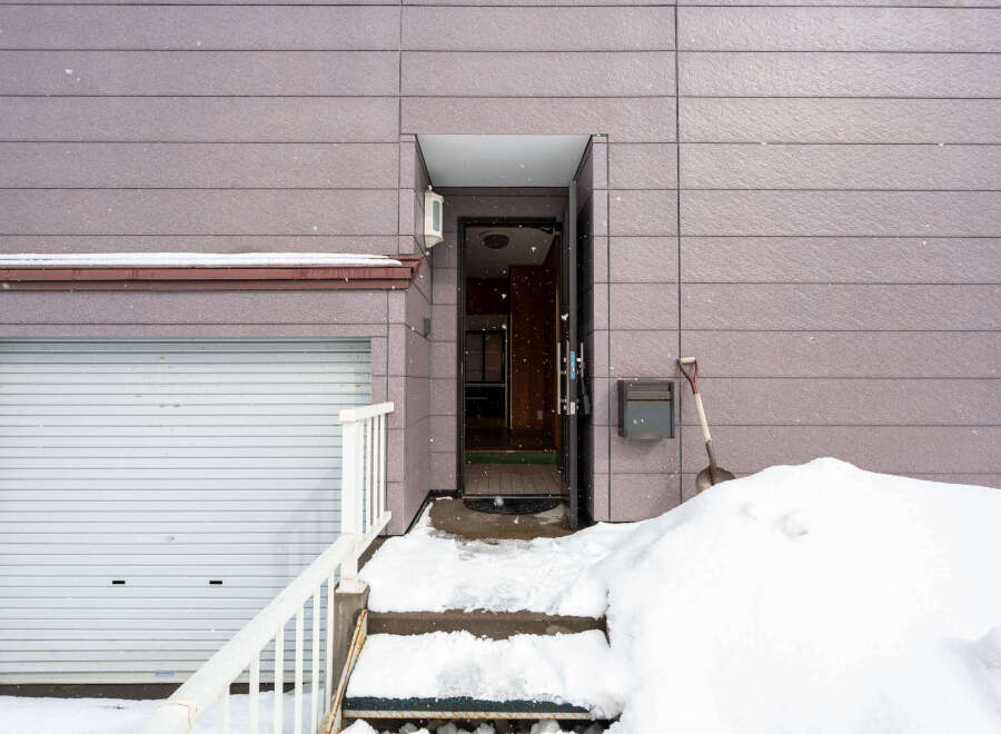 This charming home features a convenient attached garage, perfect for storing vehicles and other belongings.