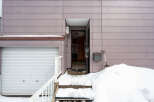 This charming home features a convenient attached garage, perfect for storing vehicles and other belongings.