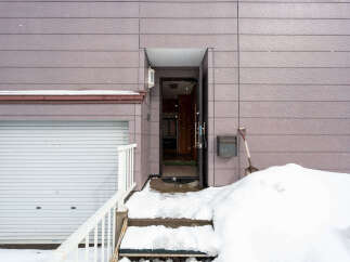 This charming home features a convenient attached garage, perfect for storing vehicles and other belongings.