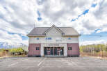 This charming Alps Niseko property boasts a spacious parking lot, perfect for guests arriving by car.