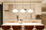 This stunning kitchen boasts a sleek design with marble backsplash and high-end stainless steel appliances.