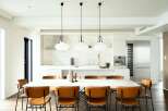 This stunning property boasts a sleek, modern kitchen with marble countertops and high-end stainless steel appliances.