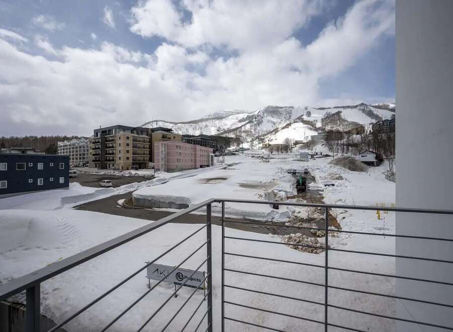 Luxury apartments with breathtaking views of snow-capped mountains and ski slopes.