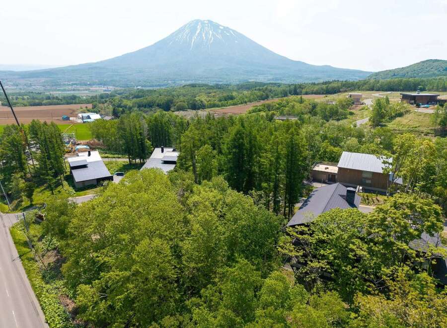 Nestled in a serene forest setting with breathtaking views of a majestic mountain, this property offers an idyllic escape.