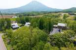 Nestled in a serene forest setting with breathtaking views of a majestic mountain, this property offers an idyllic escape.