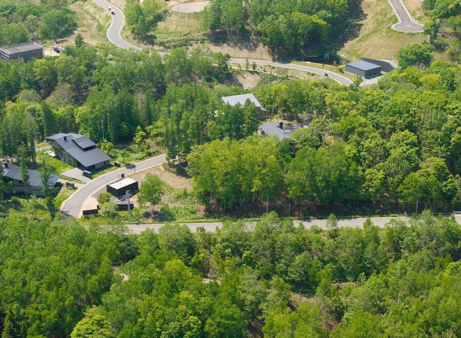 Nestled in a lush forest, this secluded property offers a tranquil escape.