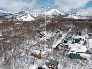 Discover this stunning property nestled in the heart of the Hokkaido mountains, offering breathtaking views of both Moiwa and Annupuri Ski Areas.