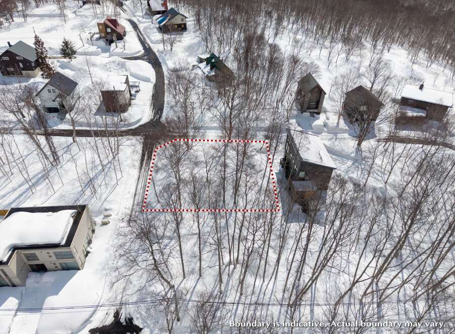 Discover this exceptional land nestled in a serene snowy landscape, offering breathtaking views and ample space to build your dream home.