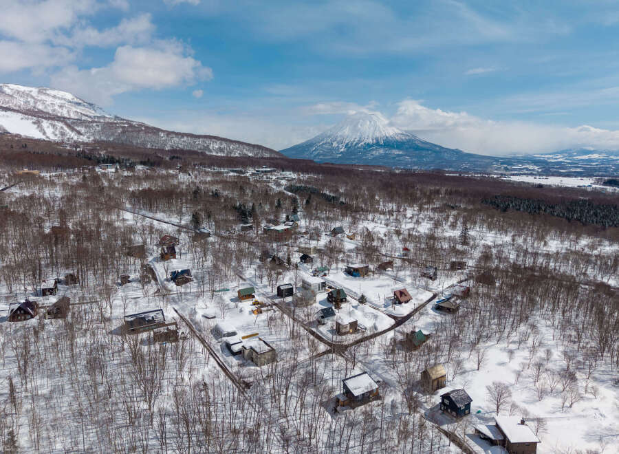 Nestled in a snowy landscape, this charming winter village offers a serene escape.