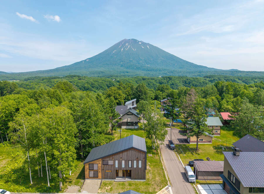 Nestled in a serene forest setting with breathtaking mountain views, this stunning property offers a tranquil escape.