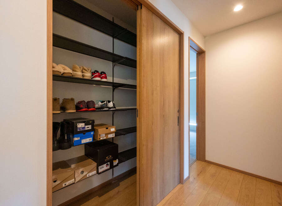 This stunning property boasts a spacious entryway with built-in storage, perfect for keeping your belongings organized.