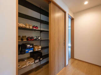 This stunning property boasts a spacious entryway with built-in storage, perfect for keeping your belongings organized.