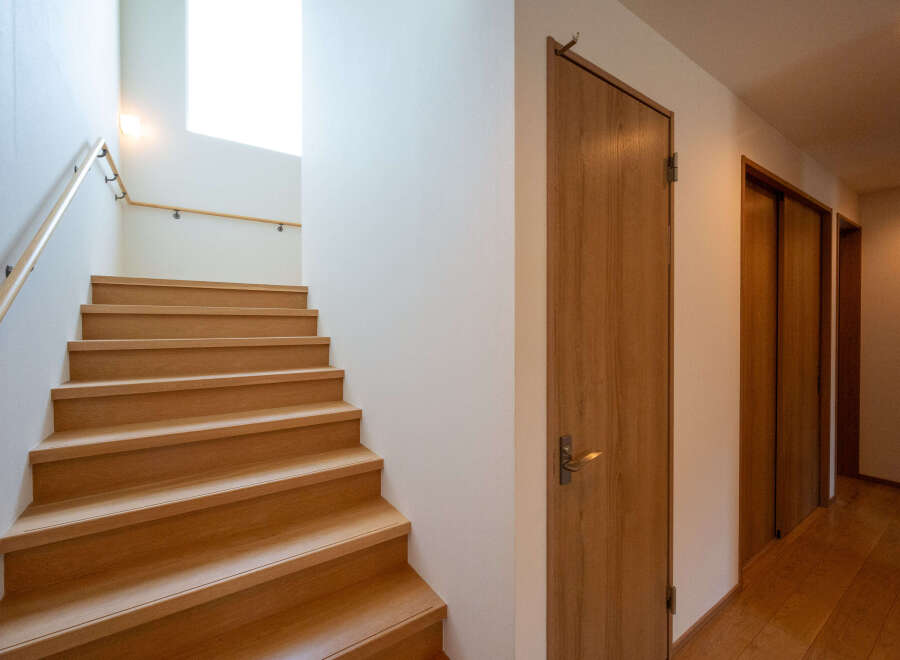 This stunning property boasts a beautiful wooden staircase, leading to more living space.