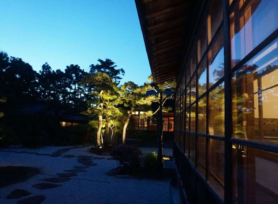 Experience tranquility in this Japanese-style house nestled amidst lush greenery.