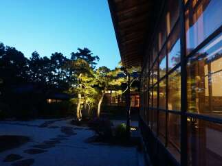 Experience tranquility in this Japanese-style house nestled amidst lush greenery.