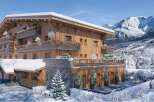 Luxury chalet in the French Alps with stunning mountain views.
