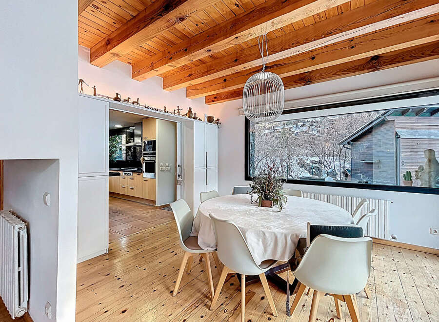 This stunning property boasts a beautifully designed dining area, perfect for hosting gatherings.