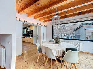 This stunning property boasts a beautifully designed dining area, perfect for hosting gatherings.