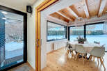 Step into a winter wonderland with this stunning property, featuring a bright and airy dining area.