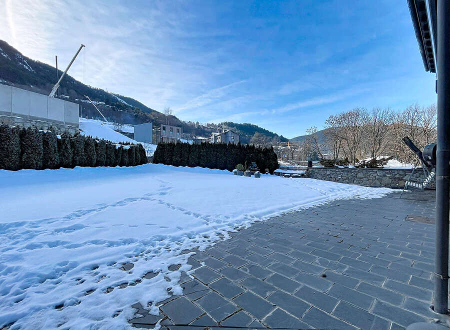 Discover the charm of this stunning property, perfectly situated in a serene, snow-covered landscape.