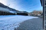 Discover the charm of this stunning property, perfectly situated in a serene, snow-covered landscape.