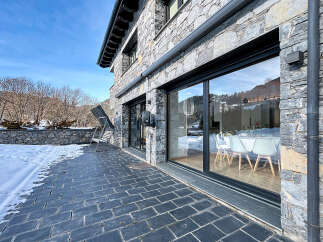 Discover luxury living in this stunning stone-clad property.