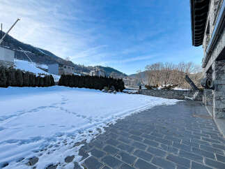 This stunning property boasts a beautiful outdoor space, perfect for enjoying the crisp mountain air.