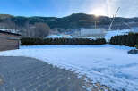 This stunning property offers a serene winter landscape, perfect for those seeking tranquility.