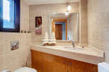 This stunning bathroom features a modern design with a touch of elegance.