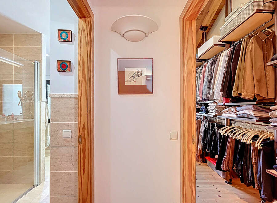 Step into luxury with this stunning property featuring a beautifully designed walk-in closet, perfect for organizing your wardrobe.