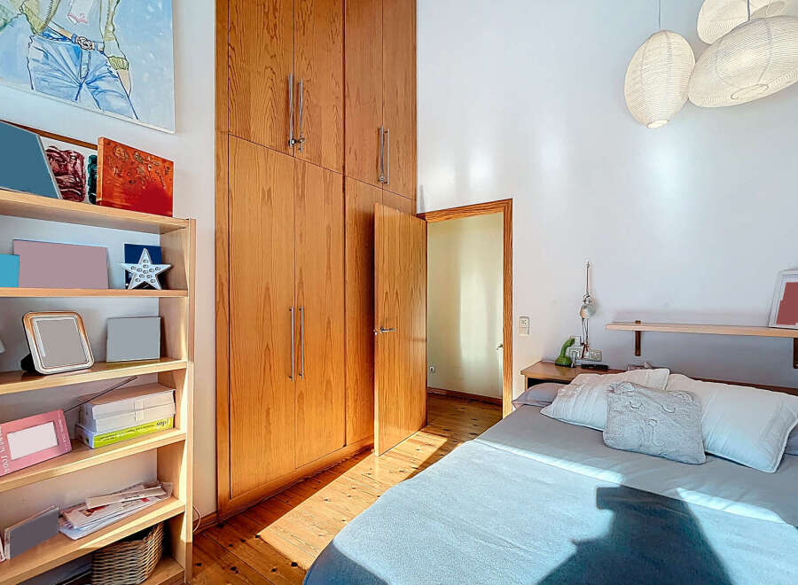 Discover a cozy bedroom with a warm, inviting atmosphere.