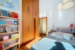 Discover a cozy bedroom with a warm, inviting atmosphere.