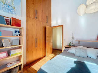 Discover a cozy bedroom with a warm, inviting atmosphere.