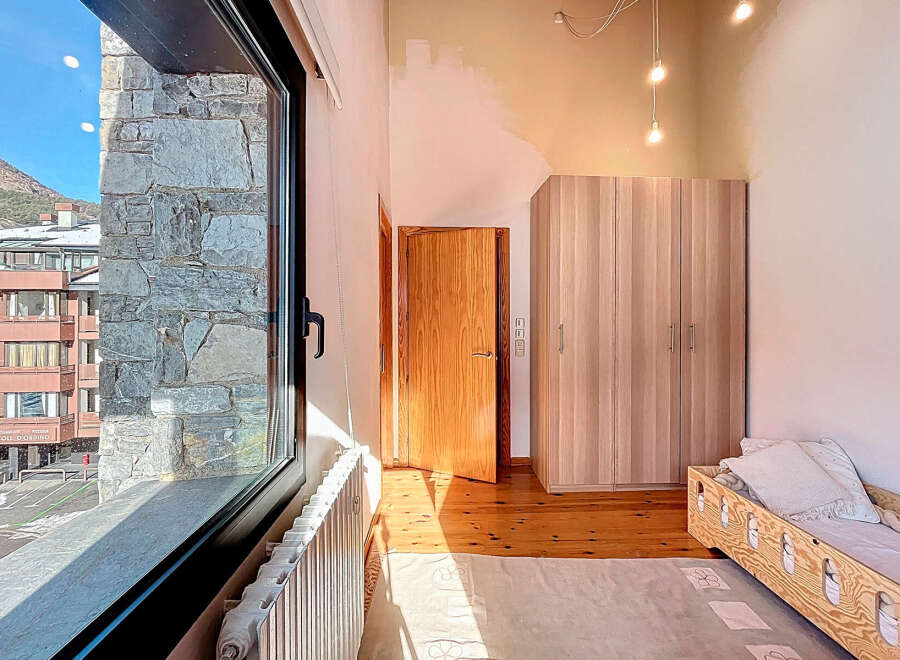This charming property boasts a bright and airy bedroom with stunning views.