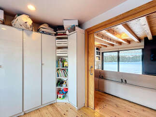 This stunning property boasts a modern interior with ample storage solutions.