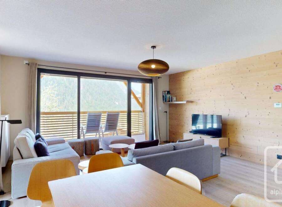 Stunning apartment boasting breathtaking mountain views from its spacious balcony.