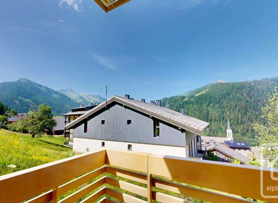 Mountain view apartment in Les Gets with balcony.