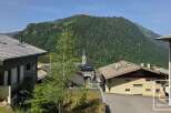 This stunning property boasts breathtaking mountain views and a prime location in a charming village.