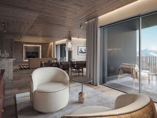 Luxury chalet apartment boasting stunning mountain views and a spacious open-plan living area.