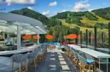 This stunning rooftop bar boasts breathtaking mountain views and a sleek, modern design.