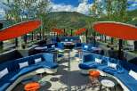 Relax and soak up the sun on our rooftop terrace, complete with comfortable seating, fire pits, and stunning mountain views.