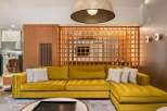 This stunning property boasts a modern and inviting living space, perfect for relaxation and entertaining.