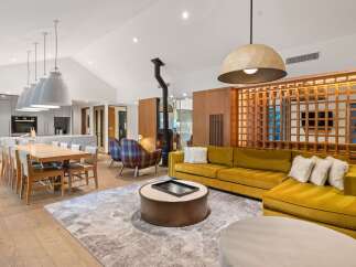Experience luxury living in this stunning property, featuring a modern open-plan design.