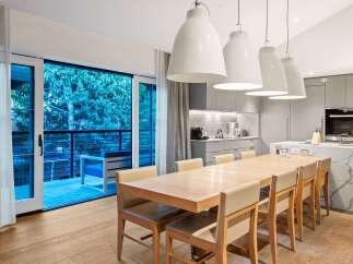 Experience modern luxury in this stunning dining area.