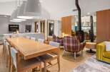 Experience modern luxury in this stunning property, featuring a spacious open-plan living area.